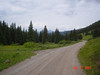 Mark > Shrine Pass Road with Mt Holy Cross in the background. If you open this picture up to original size, you can see the cross on the mountain.